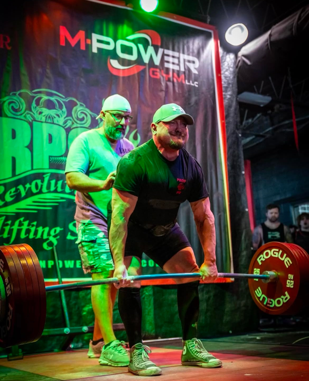 Strength athlete competing in a powerlifting meet