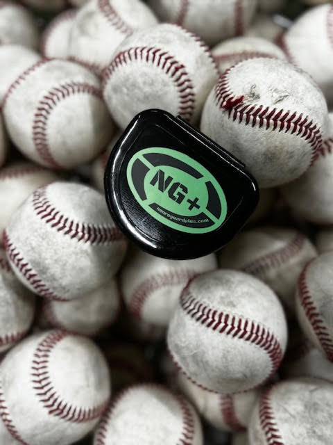 NeuroGuard+ case surrounded by baseballs