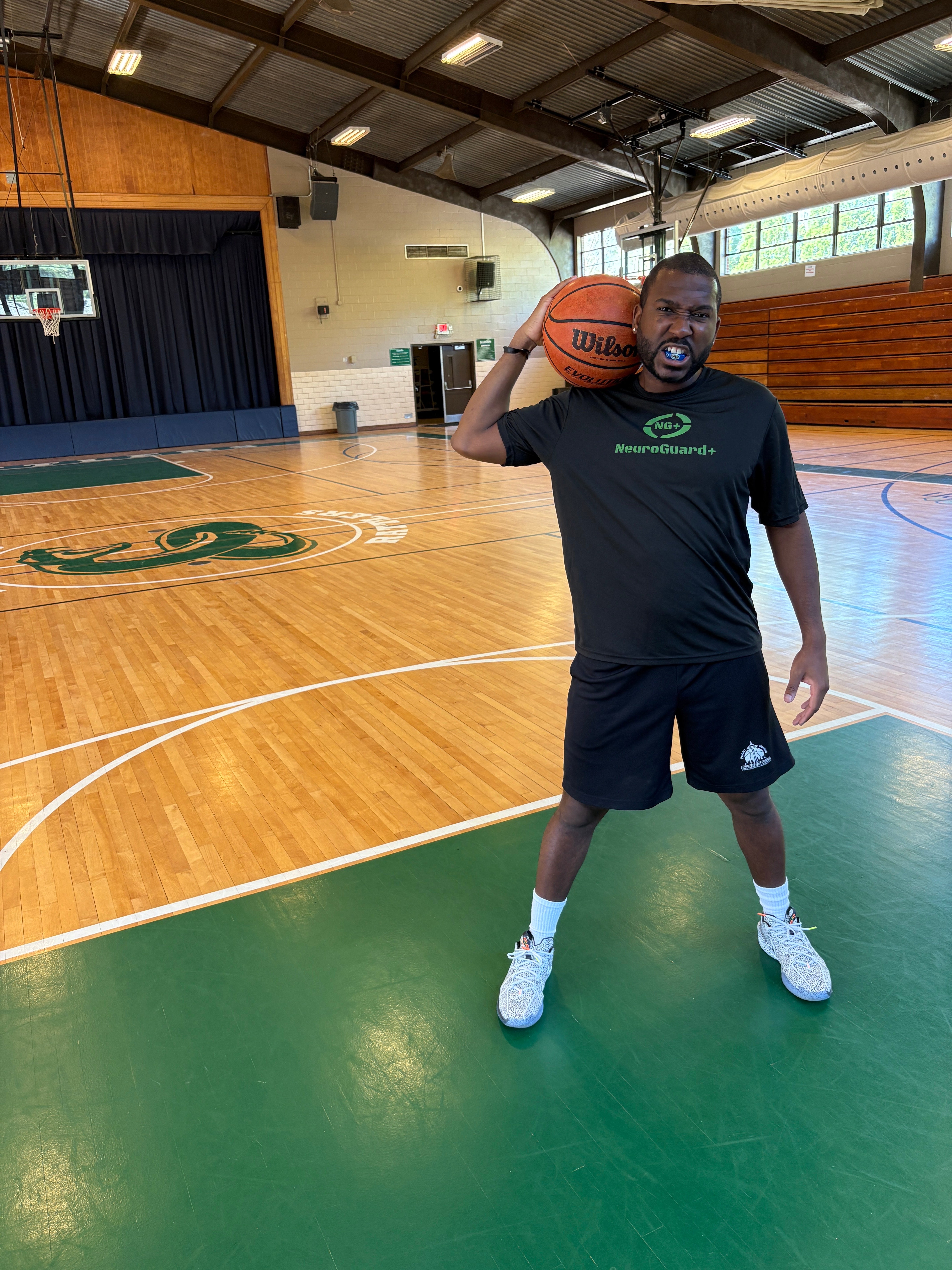 Athlete wearing NeuroGuard+ on the basketball court