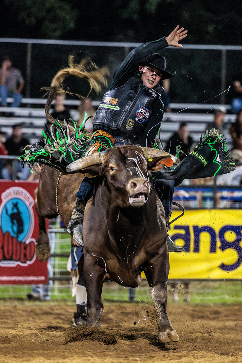 Professional bull rider competing wearing NeuroGuard+