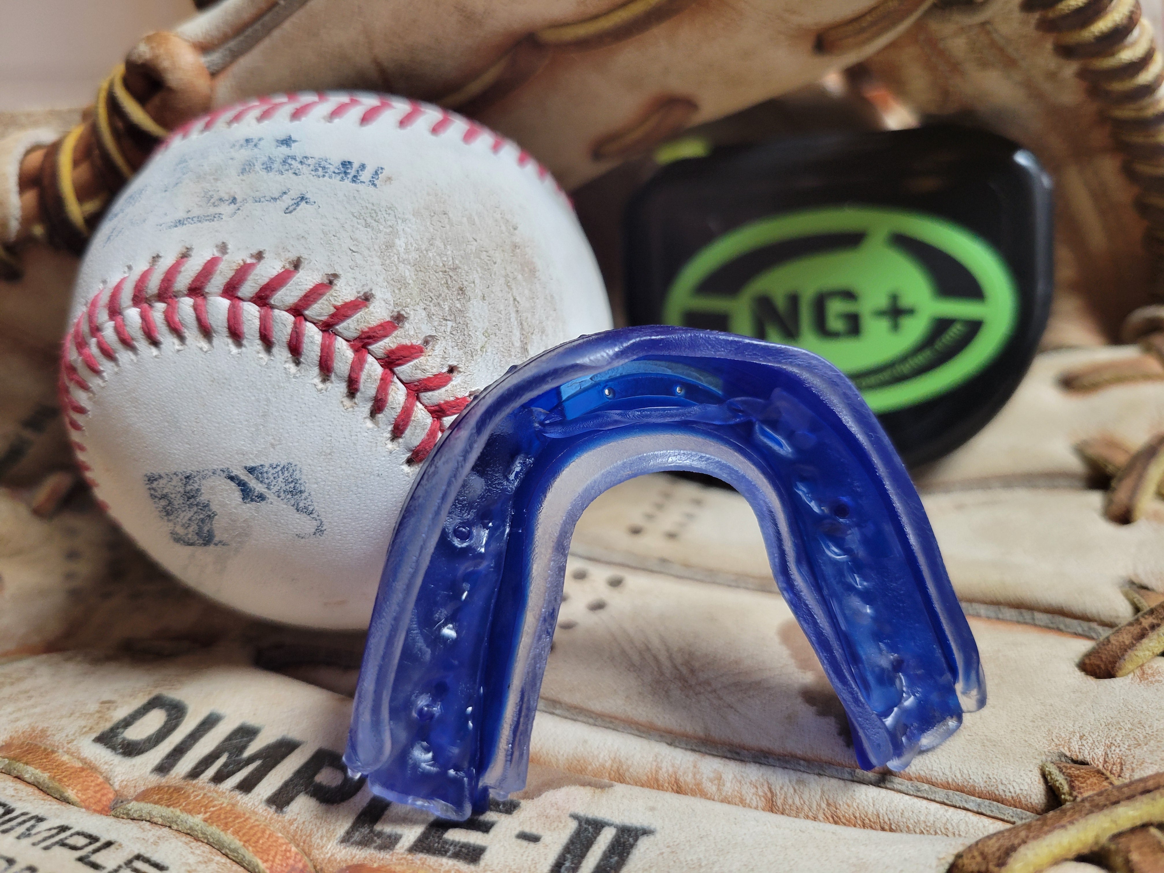 NeuroGuard+ mouthguard with baseball glove and ball