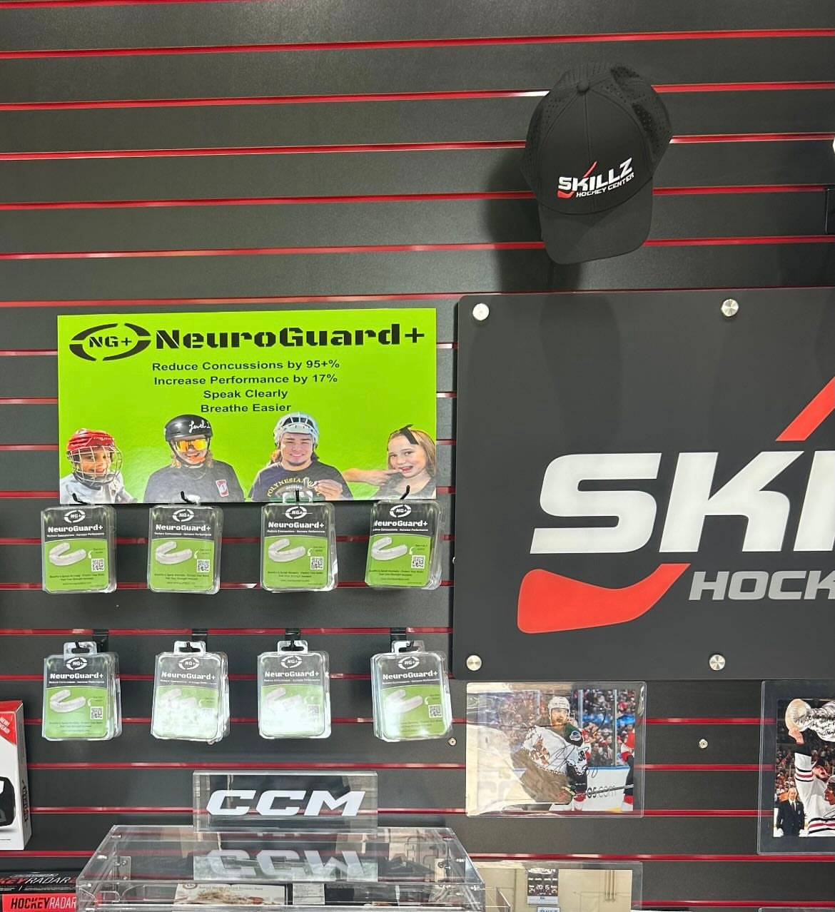 NeuroGuard+ product wall display at Skillz Hockey Center